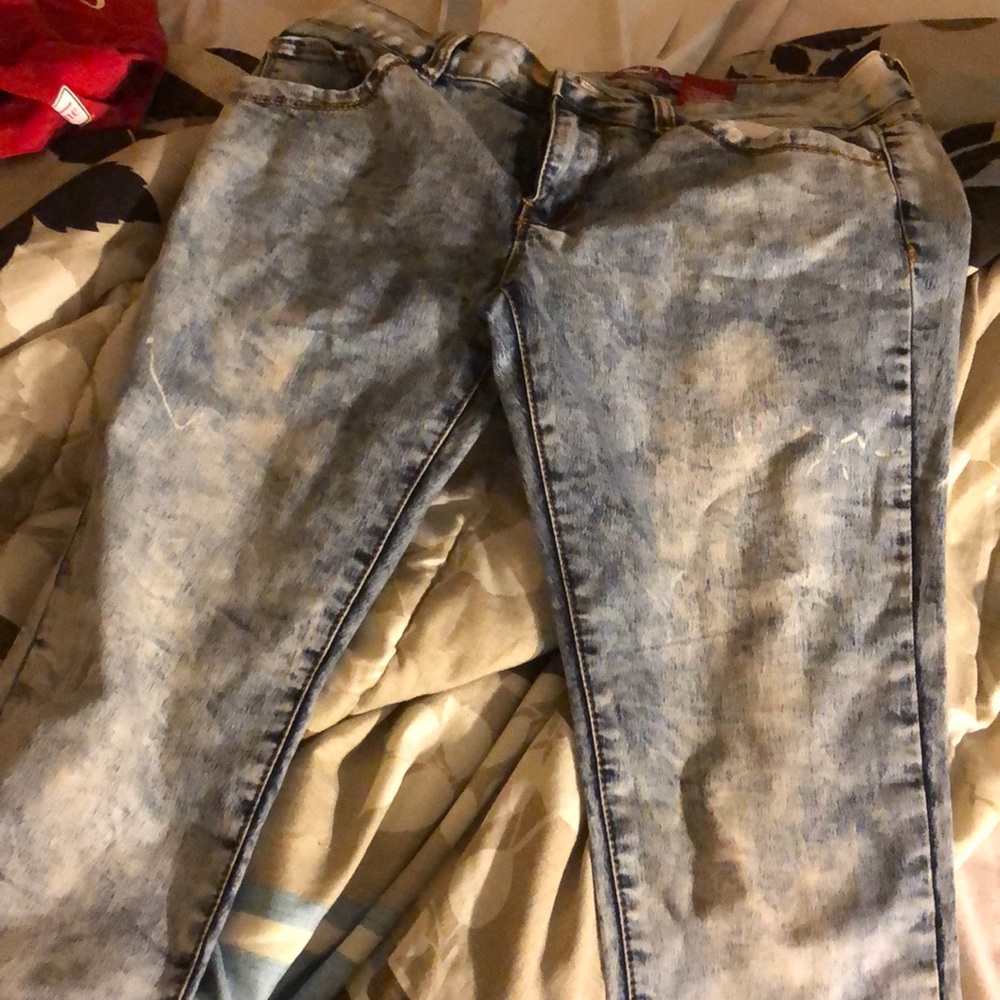 Acid washed blue jeans